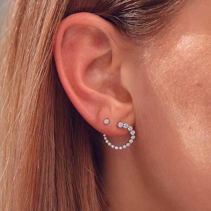 Model wearing our 7/8 CTW Lab-Grown Diamond Front Back Hoop Earrings in Solid 14K White Gold