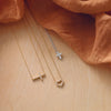 Sideways Cross Lab-Grown 1/6 CTW Diamond Adjustable Necklace in 14K Yellow Gold 