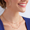 Model wearing our Modern Audrey Freshwater Cultured Pearl 18" Necklace in Solid 14K Yellow Gold with other Pearl Jewelry