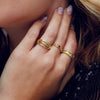 Model wearing our Natural Ruby Curb Chain Ring in 14K Yellow Gold