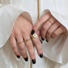 Model wearing Angel Wing Stacking Ring with Evil Eye Ring in Solid 14K Yellow Gold