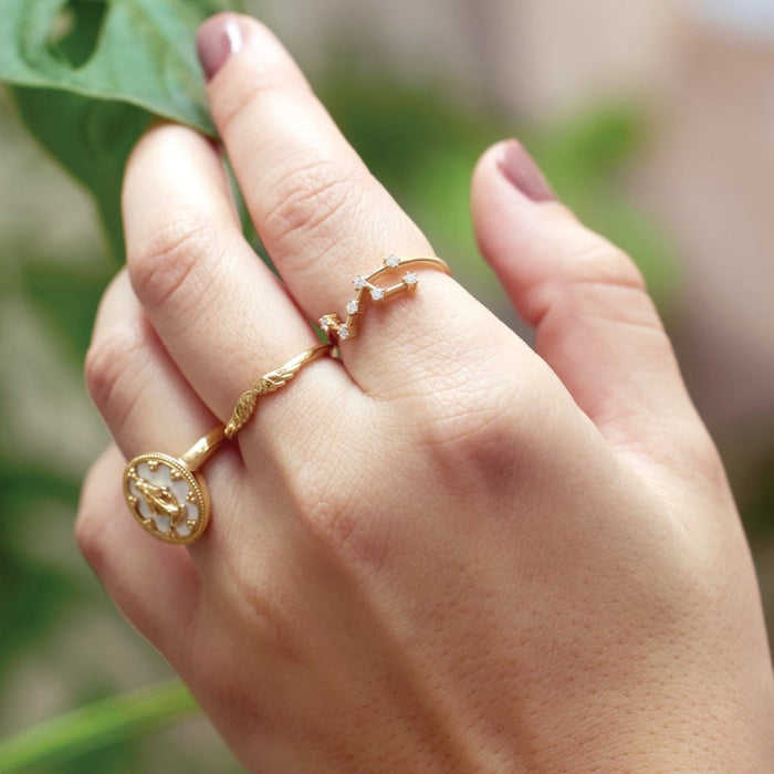 Model wearing Angel Wing Stacking Ring with Zodiac Diamond Ring in Solid 14K Yellow Gold