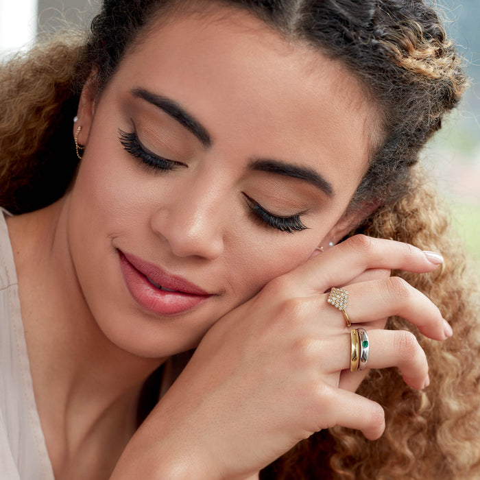 Model wearing two of our Petite Dome Ring in 14K Gold 