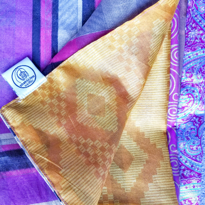 Made by Shakti.ism, the reusable sari gift wrap that we use to wrap our jewelry travel case.