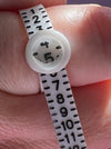 Ring Sizer Showing Size 4.5 on Finger