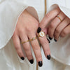 Woman wearing our Chain Link Dreams Ring in Solid 14K Yellow Gold